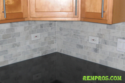marble tile kitchen backsplash